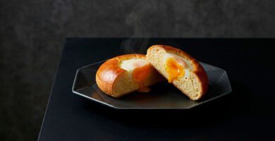 Gyeran-ppang is a classic Korean egg bread, baked soft and warm, presented in a refined modern editorial food style.